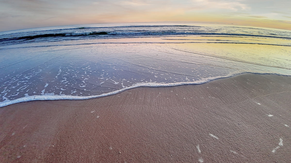 Sunrise at the beach across from condo building.  