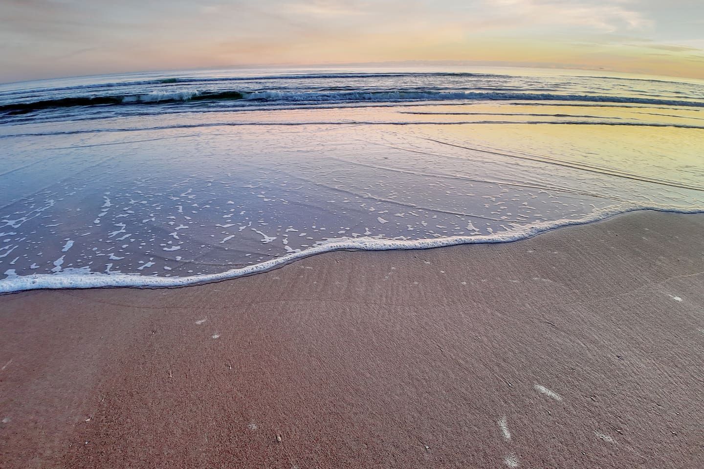 Sunrise at the beach across from condo building.  