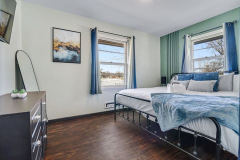 Master bedroom with TV, Dresser and double closet. You only need to bring your suitcase, everything else is here.