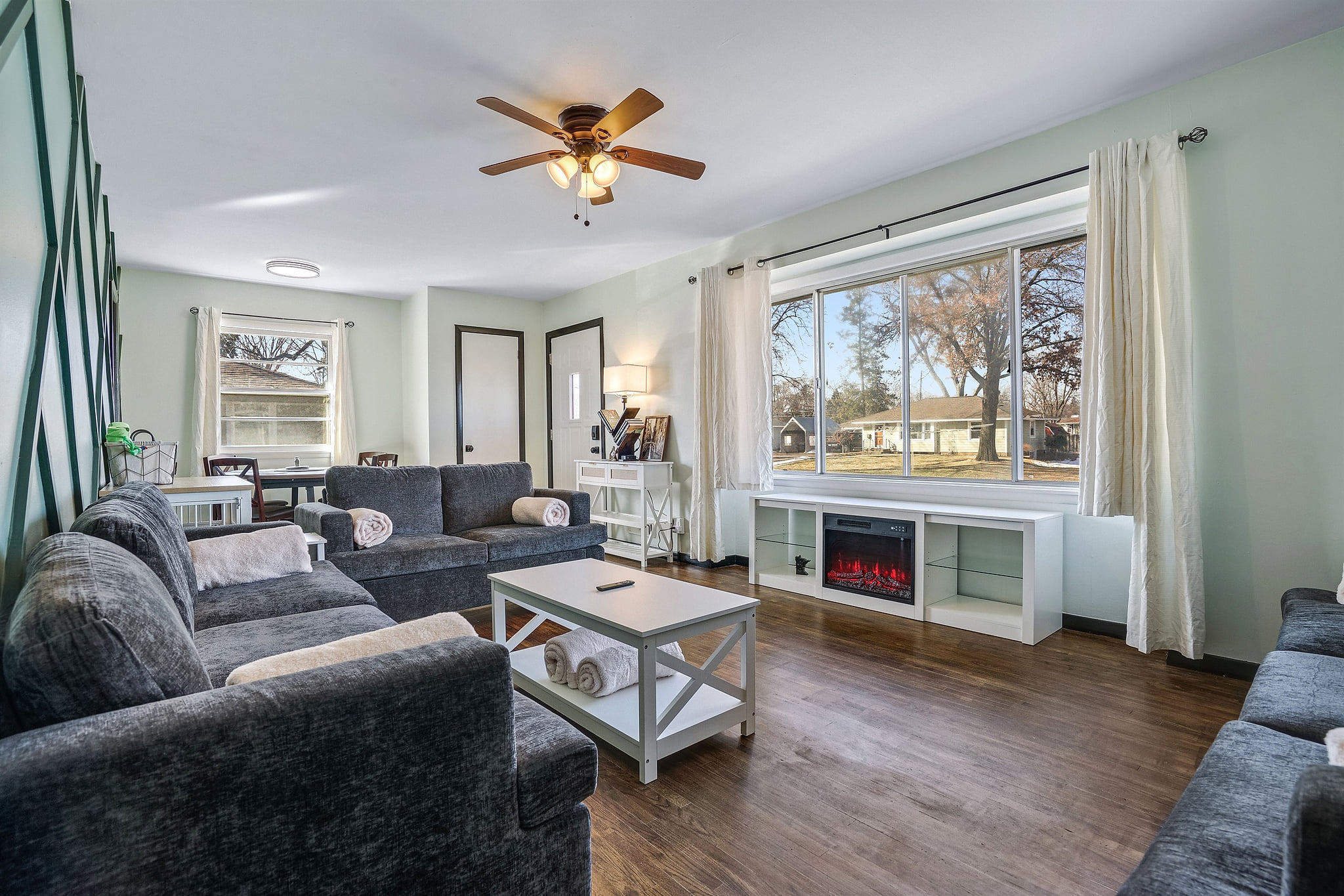 Electric fireplace for cozy nights and lots of seating to relax or visit