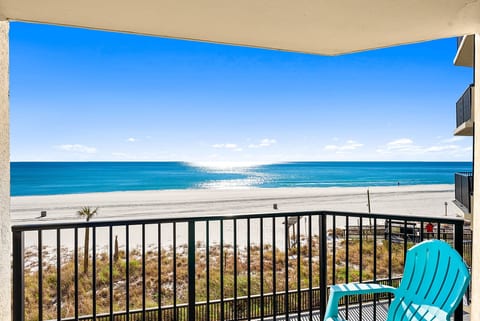 Private balcony seating with Gulf-front views, perfect for morning coffee or sunset cocktails.