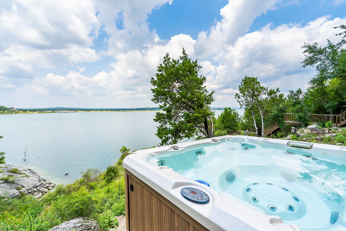 Hot tub is kept warm all year for you.