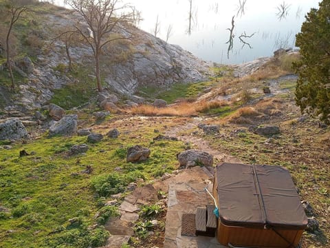 Due to the current drought you still have beautiful views of the water but it's a little further walk into the water because the invention at the end of our lot is dry. Many guests still swim and use our kayak, paddleboard, and inner tubes