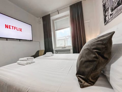 Awesome hotel beds and big TV!