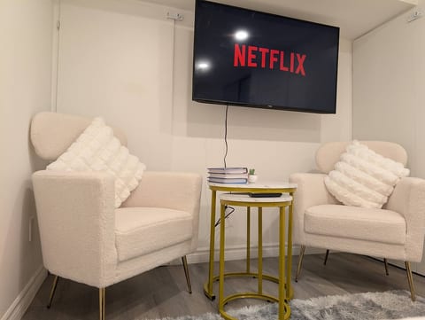 Enjoy a cup of coffee, read a book, or stream Netflix from this entertainment corner.