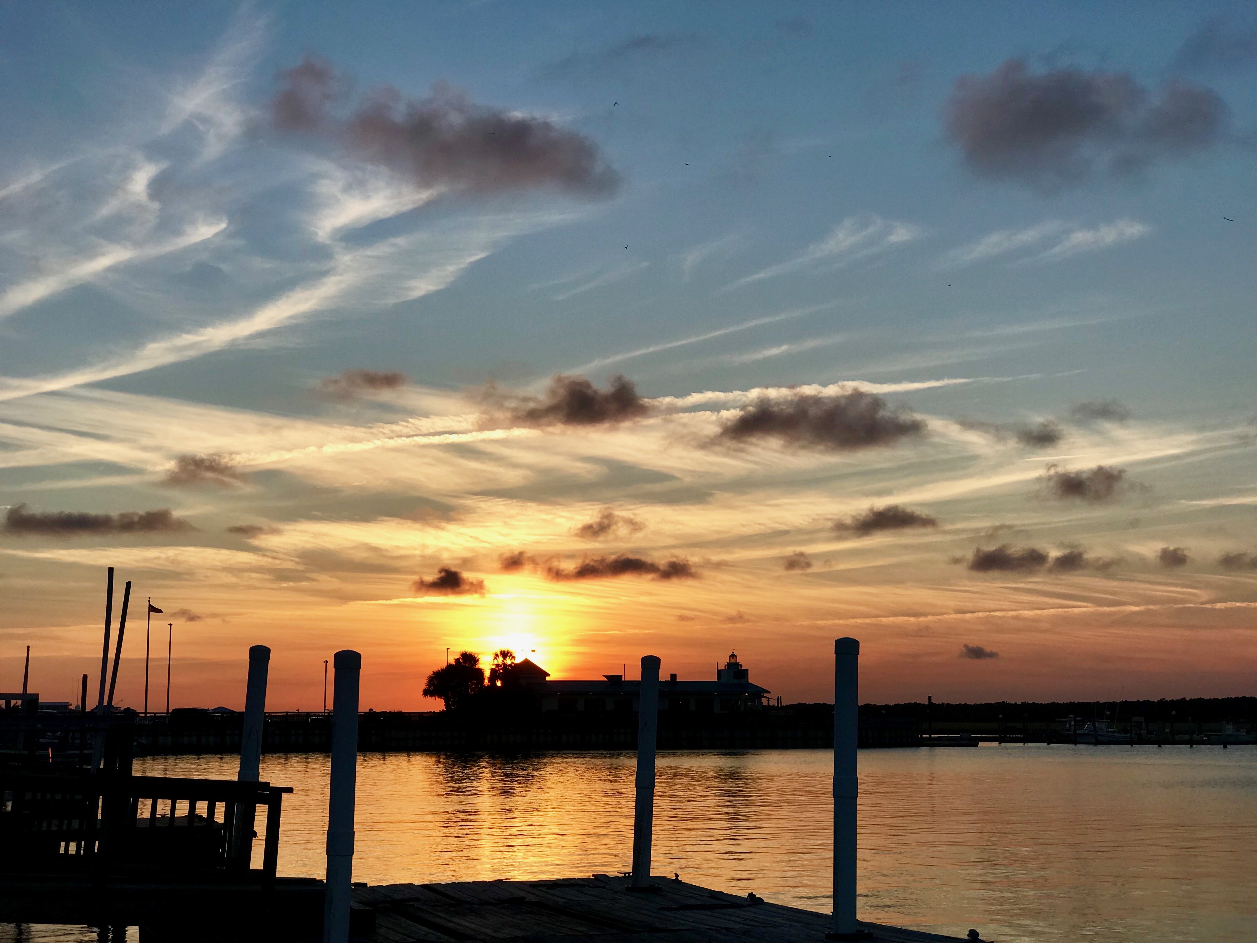 Sunset off our dock with the Lonerider in view