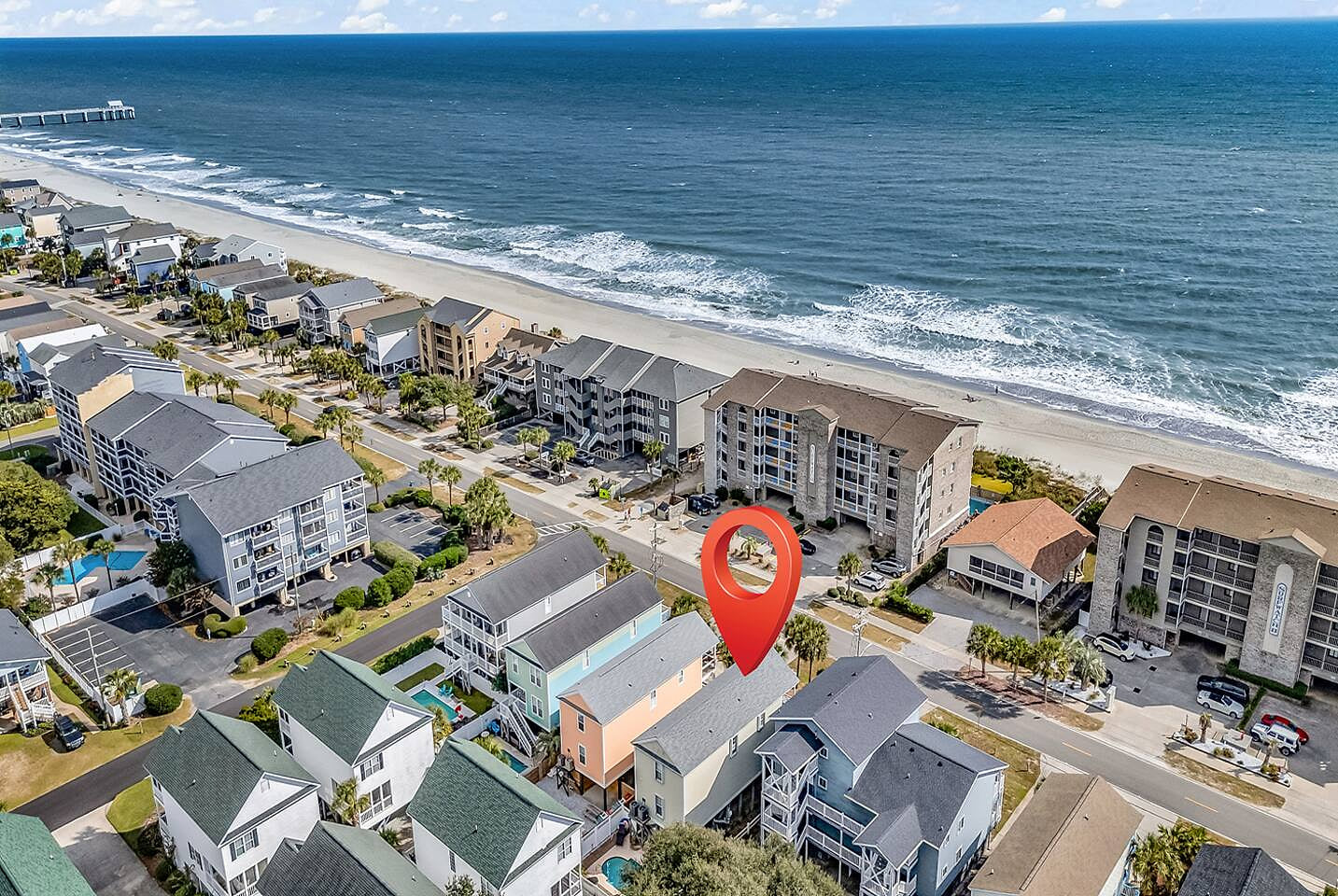 The house is across street from the beach
