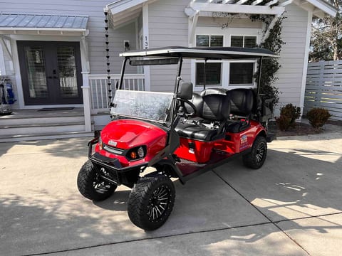 Six seater golf cart included.