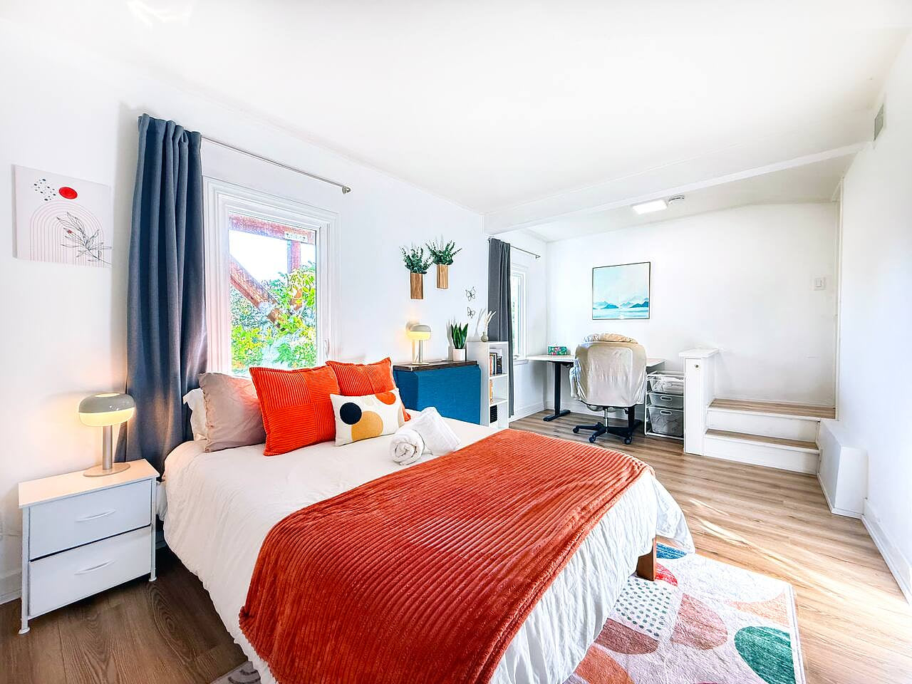 Relax or work with ease—this studio blends comfort with functionality, offering both rest and productivity.