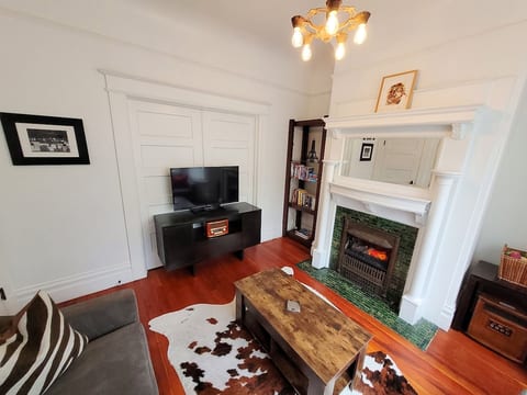 Equipped with a 40" TV, Bluetooth speaker & cozy radiant fireplace heater
