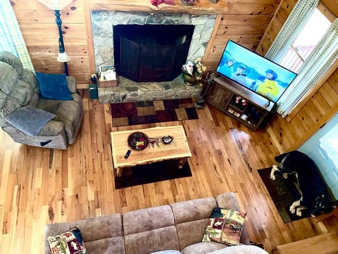 Enjoy cozy plush furniture and oversized fireplace after a day of fun in Helen. This living you will allow you to relax and feel comfy and warm