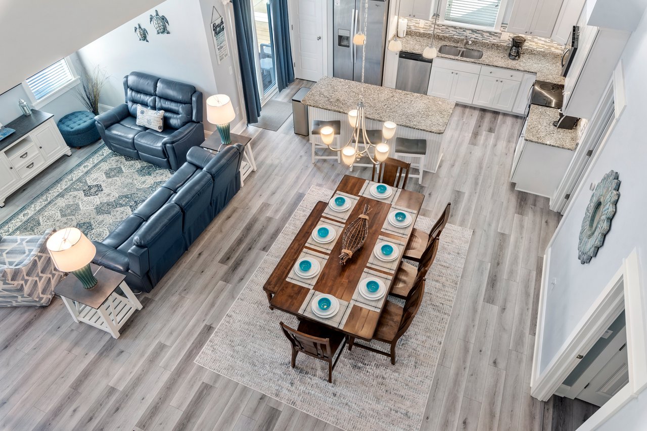 View of main floor from top floor landing