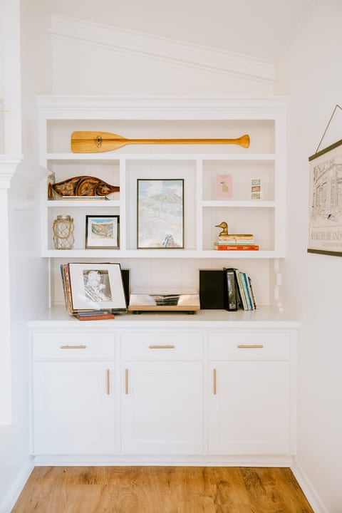 Feeling nostalgic? Play a record on the record player. Board games provided in cabinets below. 