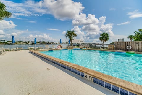 Sparkling bayside pool with waterfront views at Needle Rush Point in Perdido Key Florida
