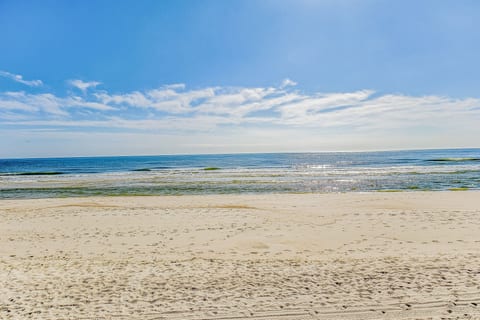 Private beach access from Wind Drift Orange Beach waterfront condominium to sugar-white sand and emerald Gulf waters