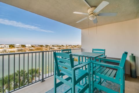 Covered balcony with Old River and Ono Island views at Wind Drift Orange Beach Alabama waterfront vacation rental condo