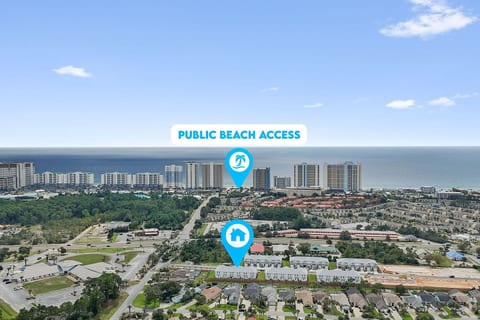Enjoy pristine white sand beaches of Panama City Beach, Florida, just a short walk from our brand new modern beach townhouse.