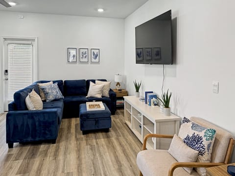 Open and Modern: Enjoy the seamless flow of living and kitchen areas, ample light, and a spacious feel. Perfect for cooking, relaxing, or entertaining with 65" RokuTV, hand selected bestseller and coffee table books, and some board games for everyone