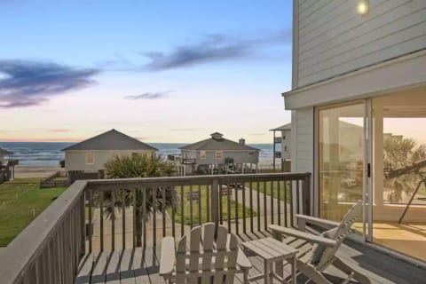 The private patio off of the Primary suite has outdoor seating for two and a telescope to gaze at the stars!