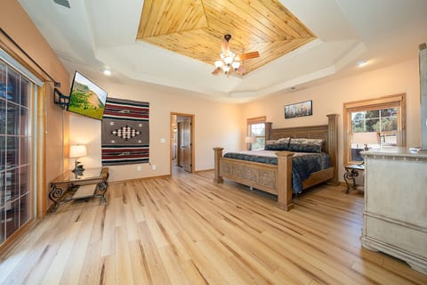 The spacious master suite has a super comfortable king bed, and sliding door access to the balcony.