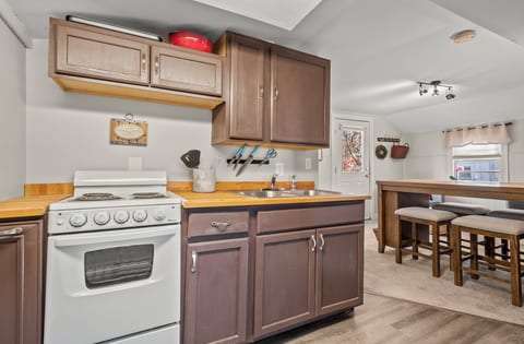 Cozy kitchenette with breakfast bar and sunny dining nook