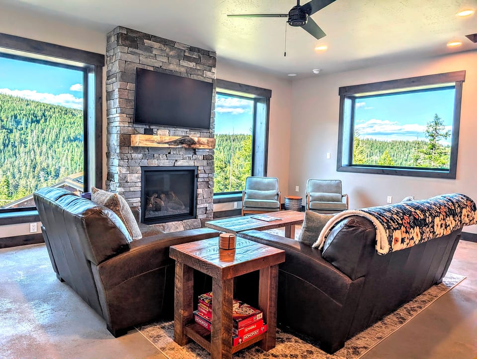 Family room, Views, Gas fireplace, Leather couches, 55" smart TV, Ceiling fan, Yoga mats