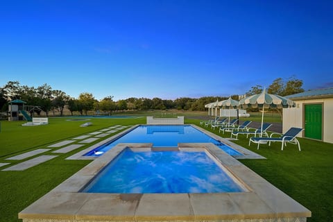 Private pool, hot tub, and deck with sun loungers