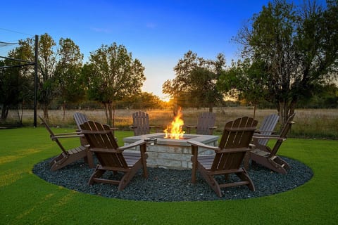 Fire pit with Adirondack chairs