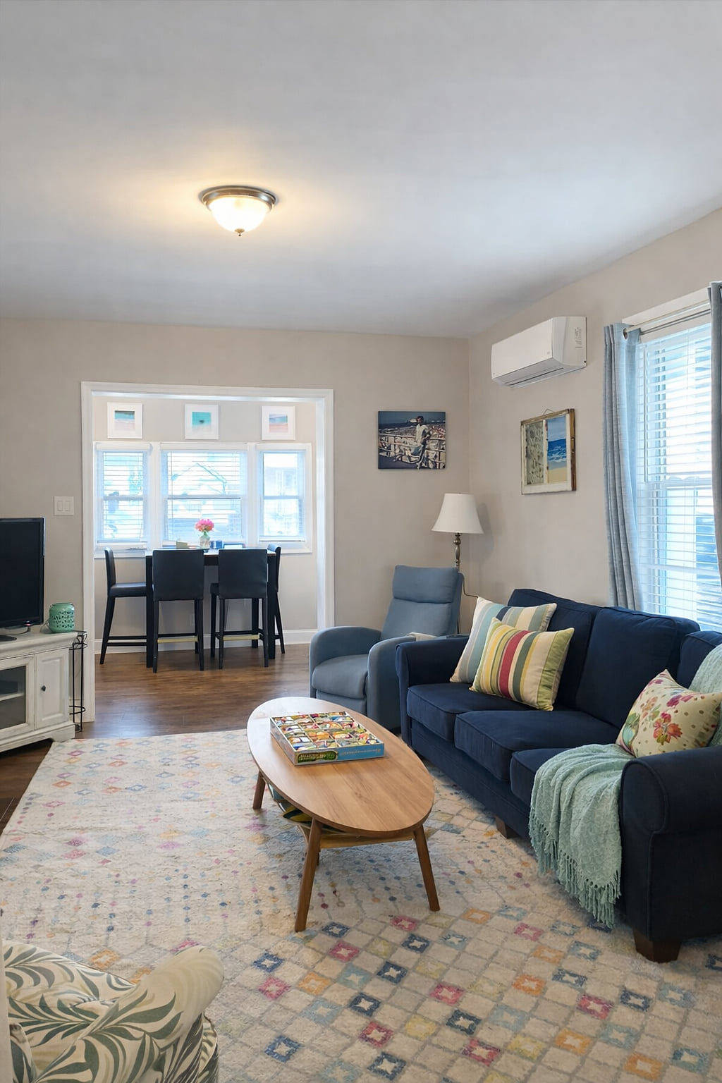 This inviting living room is perfect for movie nights, board games, and relaxing after a day out at the beach.