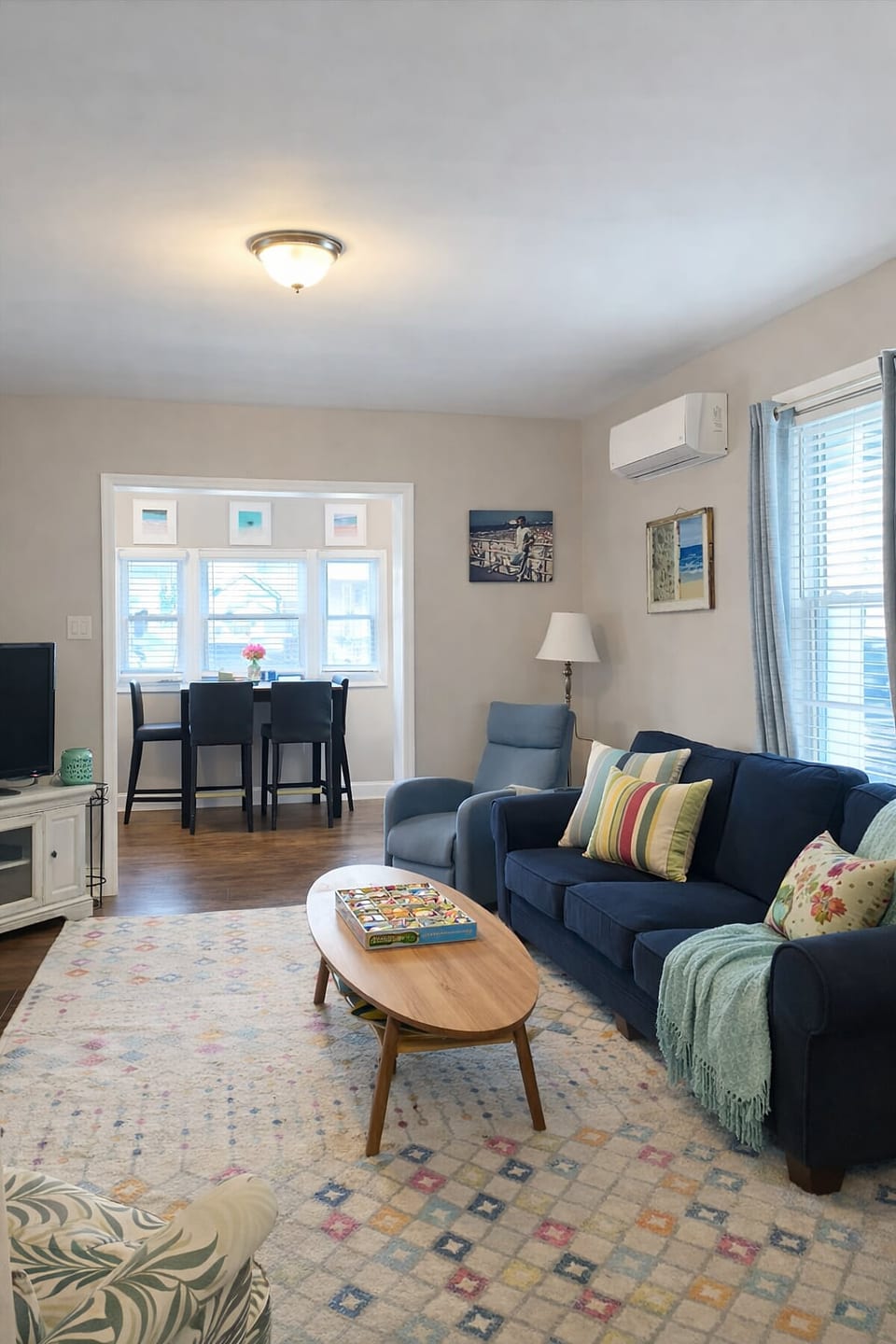 This inviting living room is perfect for movie nights, board games, and relaxing after a day out at the beach.