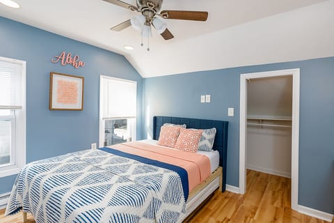 Get some R&R in this primary second floor bedroom with room darkening shades and a smart TV.