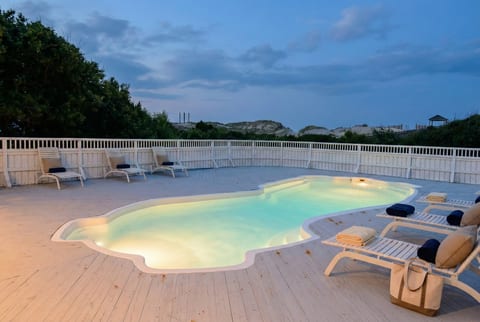Create lasting family memories at our heated private pool, nestled among OBX's sand dunes - an idyllic feature for your destination wedding or event in the Outer Banks.