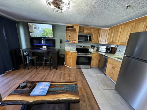 Create lasting memories in this open-concept space, perfect for entertaining or simply relaxing.