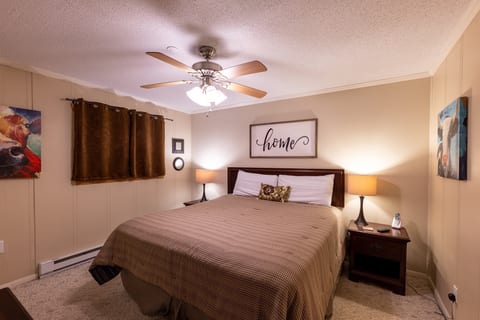Master bedroom features a king bed with attached bathroom. Relax and Rejuvenate!