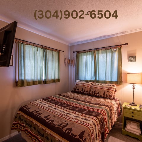Sweet dreams awaits in this Cozy queen bed.