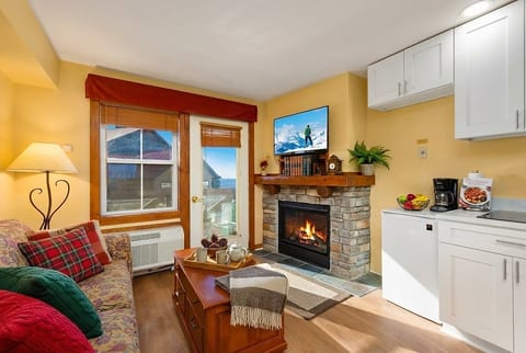 Enjoy the warmth from the fireplace while watching your favorite show!