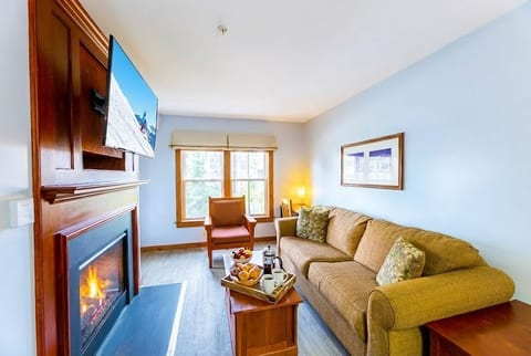 The perfect space to gather with friends and family. Enjoy the warmth of the fireplace and entertain with the smart TV.