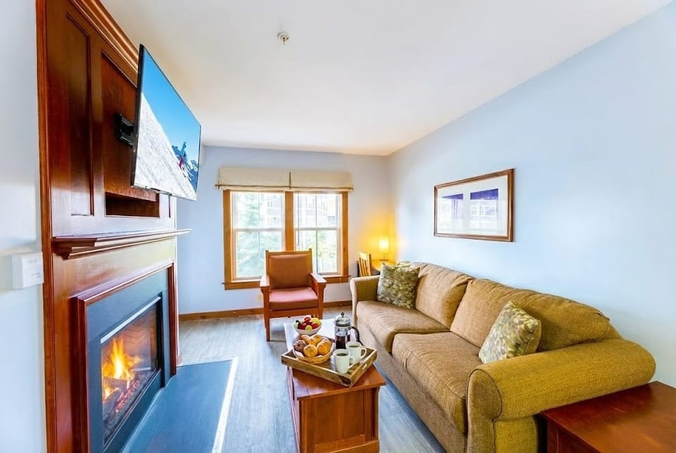 The perfect space to gather with friends and family. Enjoy the warmth of the fireplace and entertain with the smart TV.