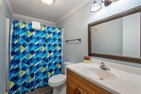 Get ready for the day in this bathroom equipped with modern amenities.