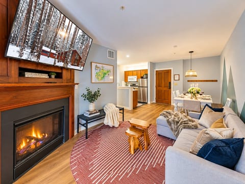 Stay entertained with the smart TV in this comfortable living space.