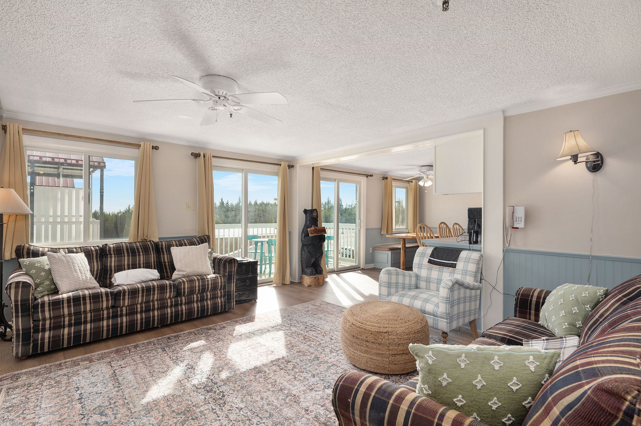 Cozy up by the fire in this spacious living room with stunning views!