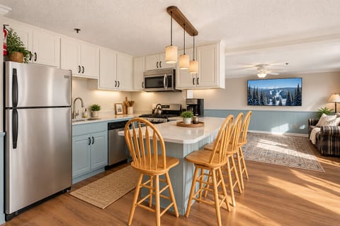 Whip up delicious home-cooked meals. Warm Modern-Rustic Kitchen Space