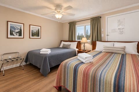 Cozy Mountain Lodge Hotel Room. Sweet dreams await in this Comfortable Bedroom!