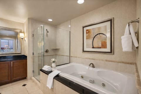 Two Full Bathrooms — Soaking Tub and Walk-In Shower, Three Private Bathrooms Total Across Both Suites