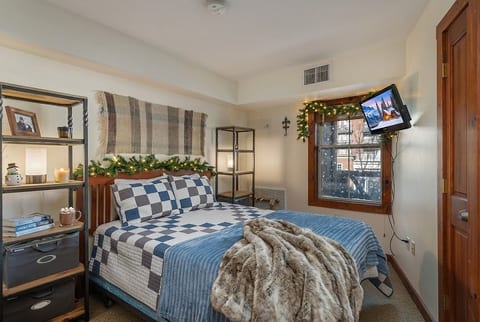 Relax in the comfortable queen bed.