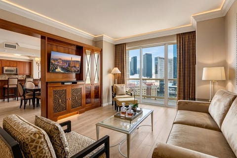 Strip-Adjacent Suite — Separate Living Area with Floor-to-Ceiling City Skyline Views, Sleeps Six