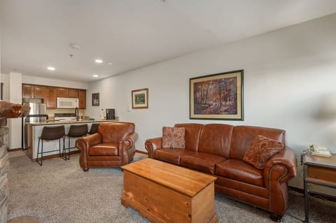 Sophisticated living area with tasteful decor! Guest Review from Austin Ray: "Our stay was amazing! The location is unbeatable, and the view from the room was breathtaking. 10/10—can’t wait to come back!"