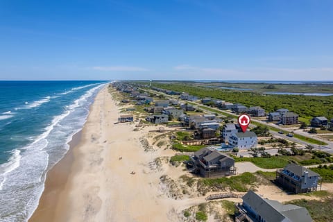 Stunning bird’s-eye view of the Outer Banks coastline — your retreat is perfectly situated for sunrise strolls and surf sessions.