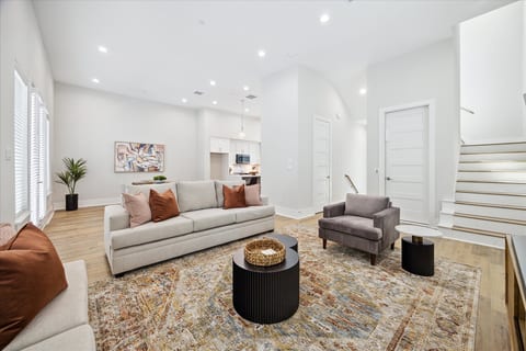Spacious & Stylish Living Room 🏡✨ - Open floor plan with elegant decor, perfect for relaxing and entertaining!