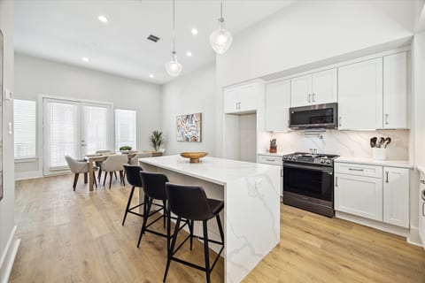 Chef’s Dream Kitchen 👨🍳🔥 - Quartz waterfall island, high-end appliances, and a sleek modern design!